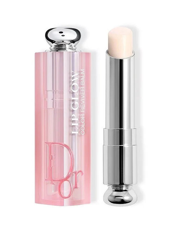 Dior Addict Lip Glow universal clear lip gloss with pH-activated color and 48-hour hydrating balm, featuring a sleek tube design.