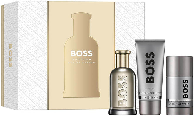 Hugo Boss Boss Bottled gift set featuring 100ml Eau de Parfum, 100ml shower gel, and 75g deodorant stick, displayed together.