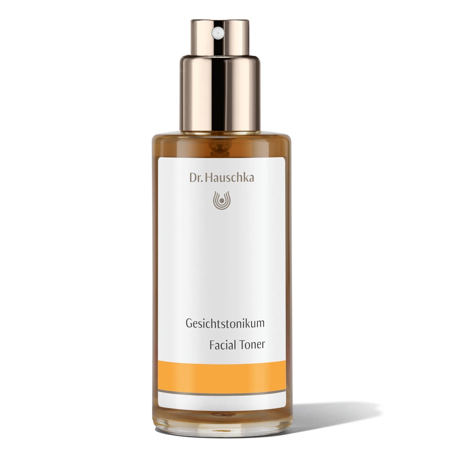 Dr. Hauschka Facial Toner 100ml bottle, visibly refining pores and improving skin elasticity in a natural skincare setting.