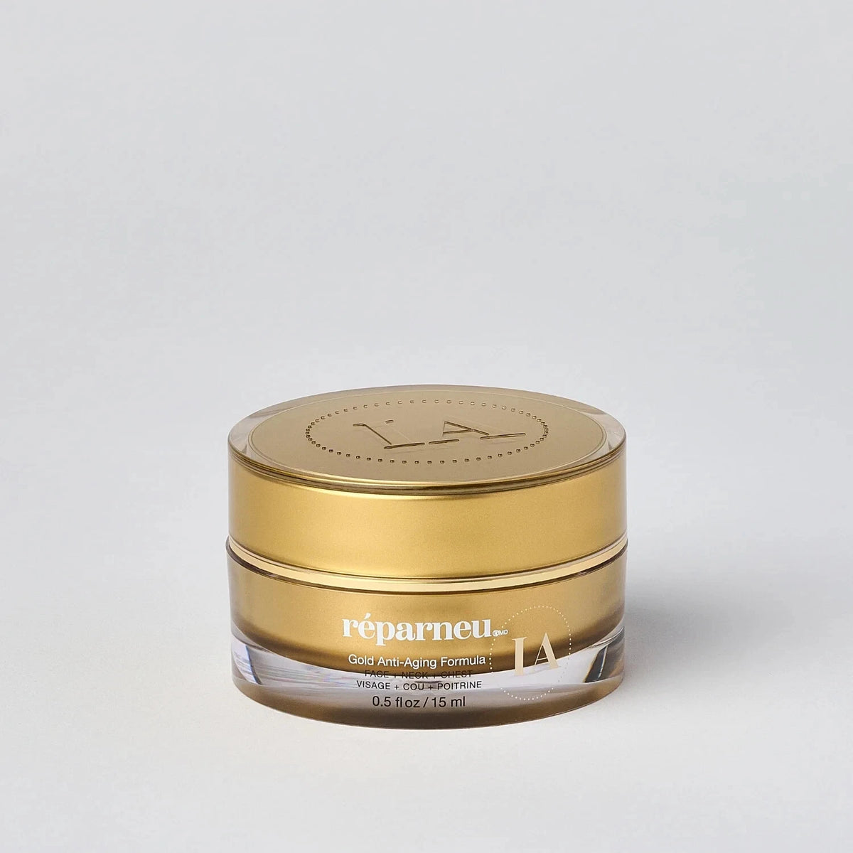 InfinitAloe Gold anti-aging face and neck cream in a 15ml jar, showcasing the luxurious gold formula for skin care.