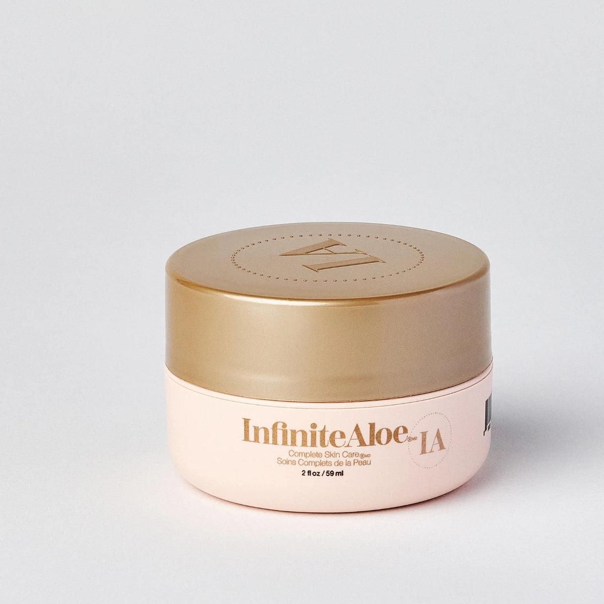 InfiniteAloe Infinite Glow Everyday Hero Skin Care Cream in 59ml jar, featuring gentle formula for radiant, smooth skin with original scent.
