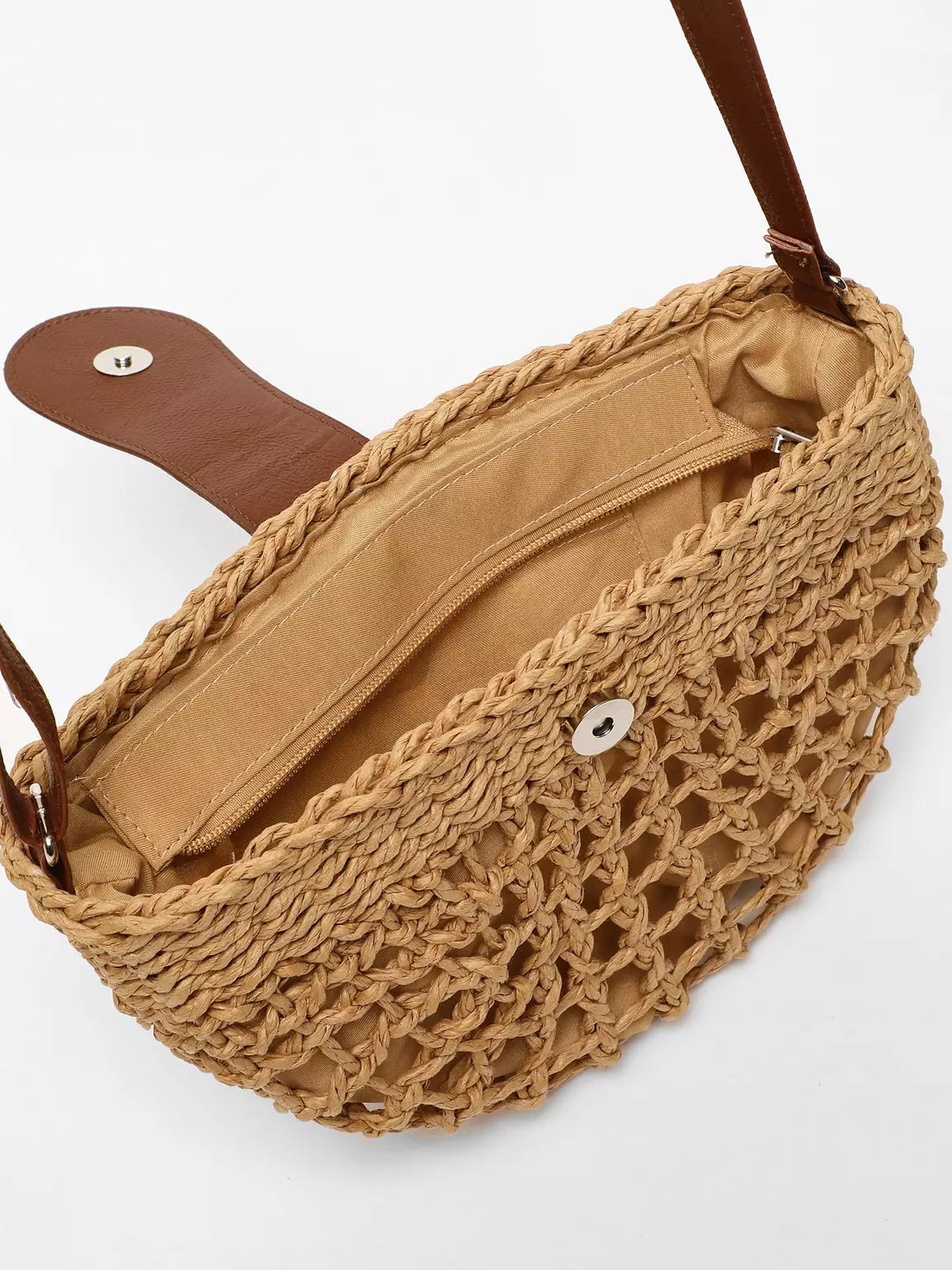 Natural straw half moon crossbody bag for women, raffia beach bag with a stylish, lightweight design.