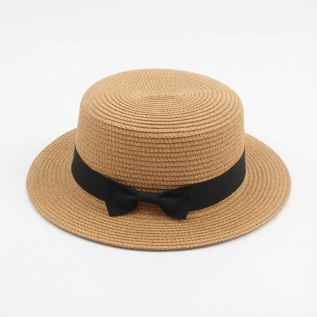 Grace Beauty woven raffia tote bag and straw hat set, perfect for travel and beach outings, featuring stylish woven straw design.
