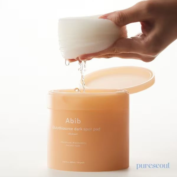 Abib Glutathiosome Dark Spot Pad Vita Touch with 60 skin care pads for brightening and reducing dark spots on the face.