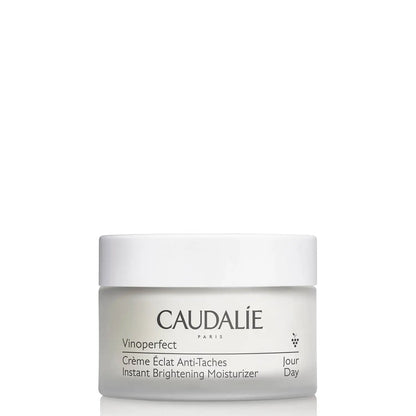 Caudalie Vinoperfect Dark Spot Niacinamide Moisturizer 50ml in a sleek lotion bottle, designed to reduce dark spots and brighten skin.